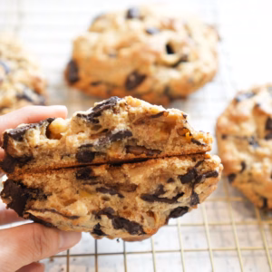 Levain-style vegan chocolate chunk walnut cookie with a thick gooey centre