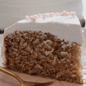 Close-up of gluten-free vegan vanilla cake crumb and frosting