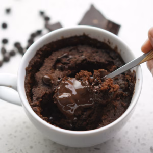 Vegan chocolate lava mugcake with a molten dark chocolate centre