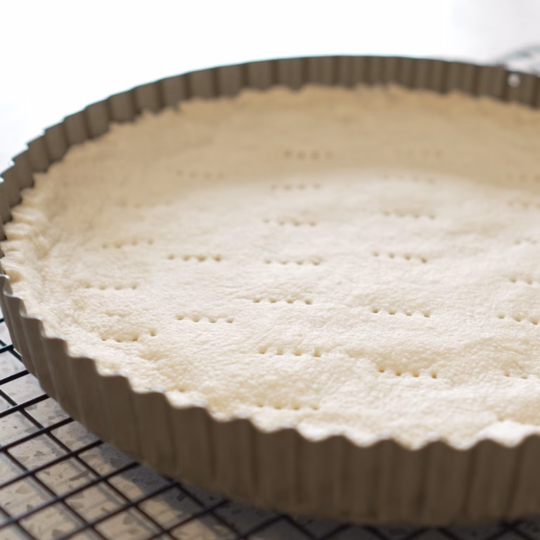 3-ingredient vegan tart crust pressed into a tart tin