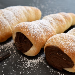 Vegan chocolate cornets filled with dairy-free chocolate pastry cream