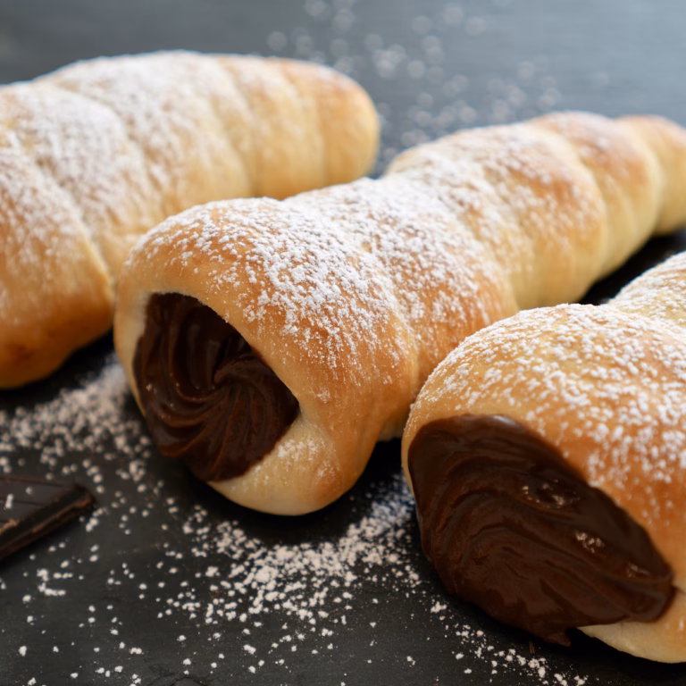 Vegan chocolate cornets filled with dairy-free chocolate pastry cream
